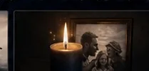 Candle beside a framed photograph as memorial gift inspiration
