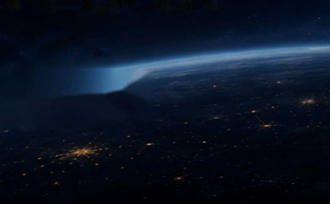 Earth viewed above a dark horizon