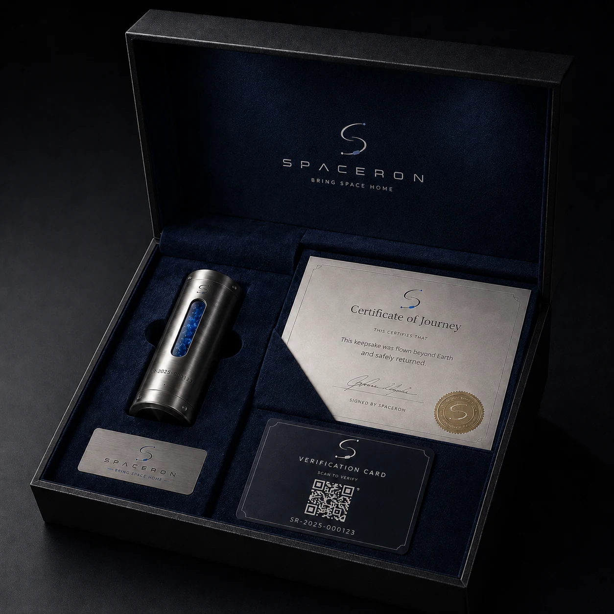 Open Spaceron presentation box showing a capsule, certificate, plaque, and verification card